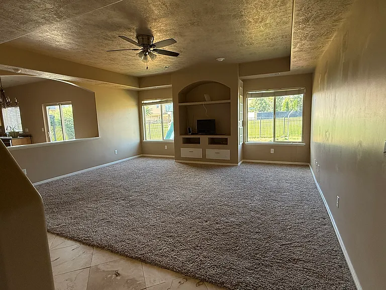 Family room Towards the Back Windows From the Foyer View