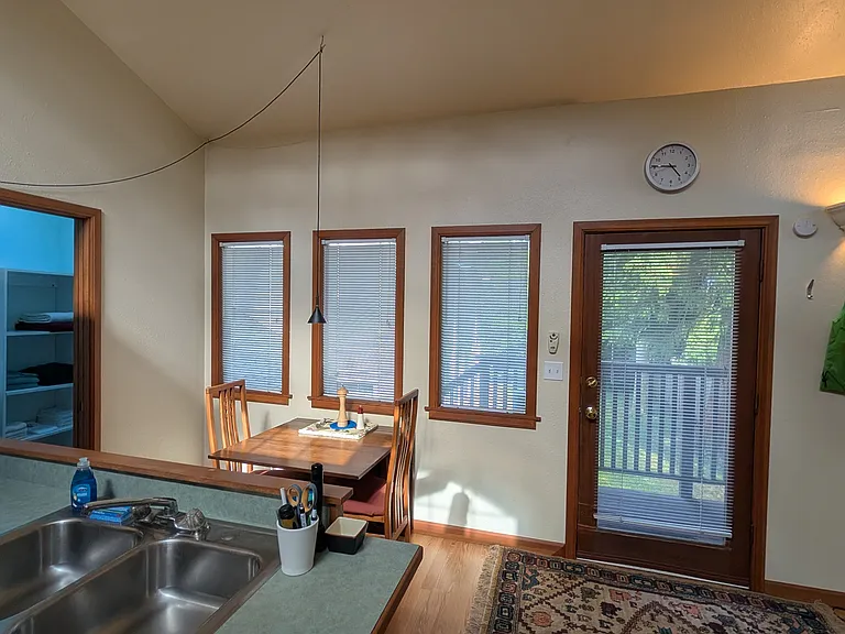 Double sink in your open kitchen looking towards entry and dining area