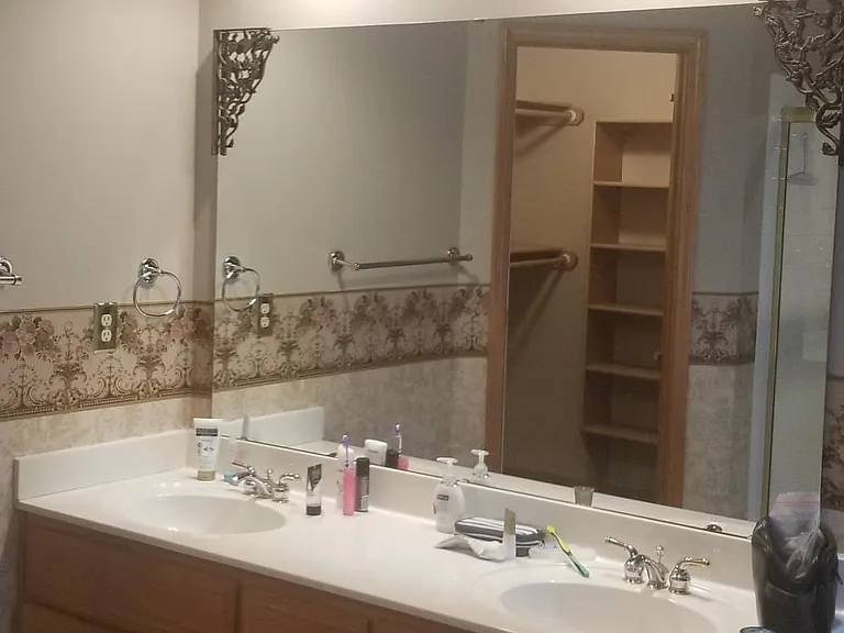 Master bathroom his & her sinks plus storage.