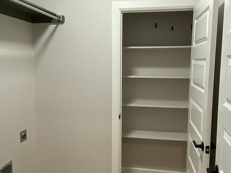 Laundry Room with Storage Closet