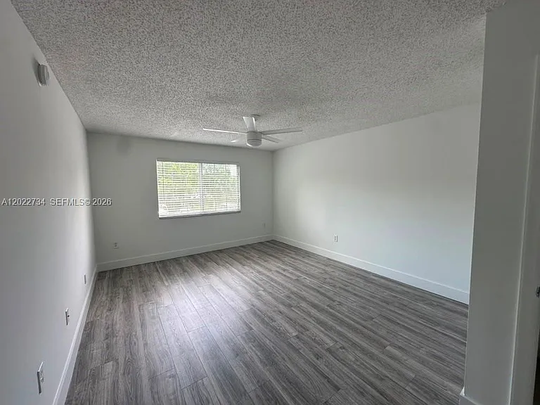 5011 Wiles Rd #203 — Photo 18