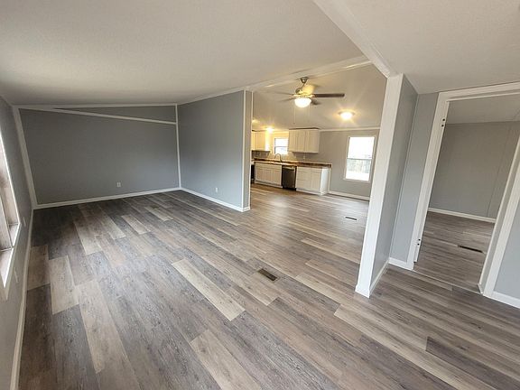 Living room and kitchen as you walk into the home.