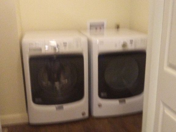 utility room with furnished w/d