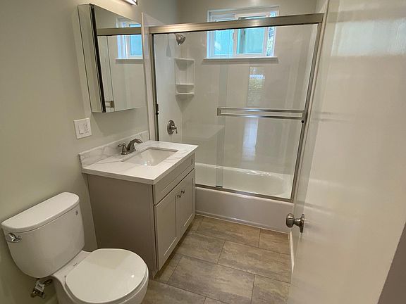 All new fixtures, cabinet, bath/shower and flooring.