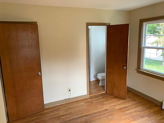 closet behind room door with light