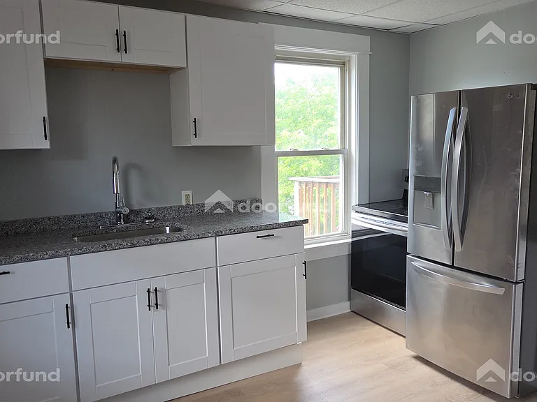 Kitchen- new stainless steel appliances, granite countertops