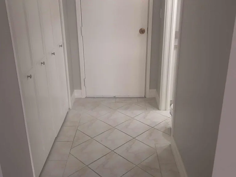Condo unit entrance with tile