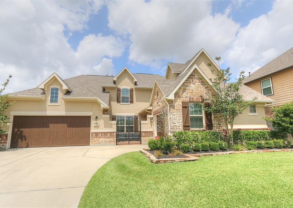 Exquisite upgrades in the beautiful home in Treeline subdivision. 3 car garages with wood looking doors.