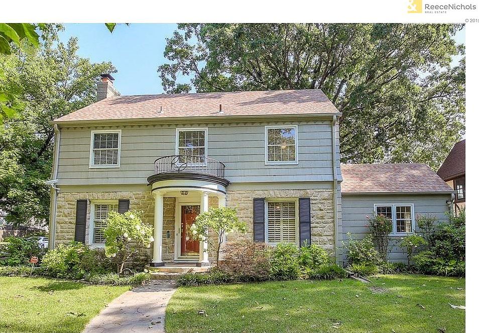 Charming exterior loaded with curb appeal on a picturesque corner lot