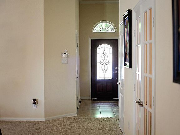 Beautiful tile entry with artistic niche.