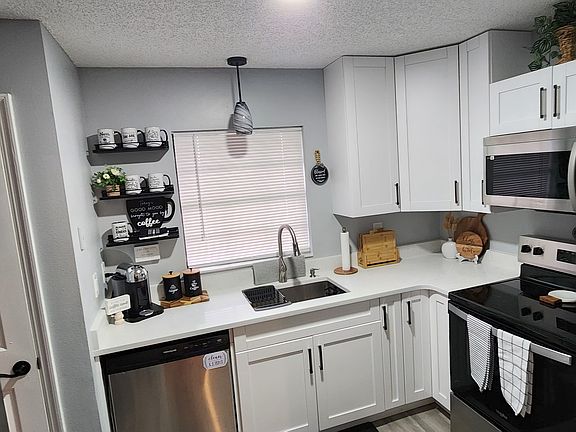 "Featuring a fully renovated kitchen with modern appeal, thoughtfully designed and fully stocked for your convenience."