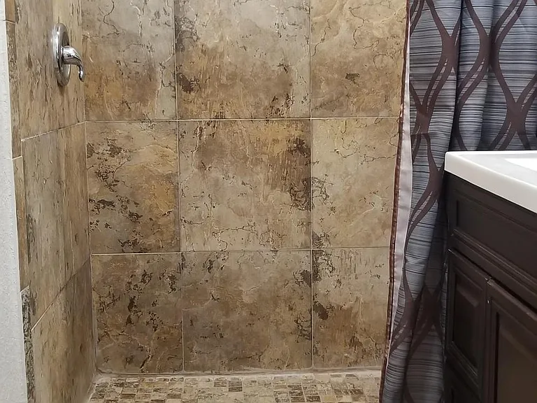 Bathroom with shower towels provided