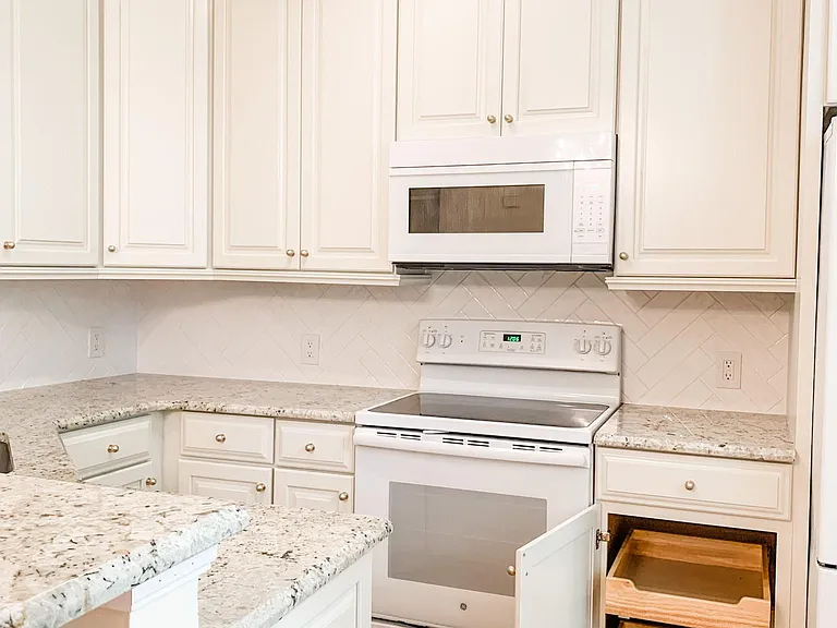 Granite countertops, custom cabinets.