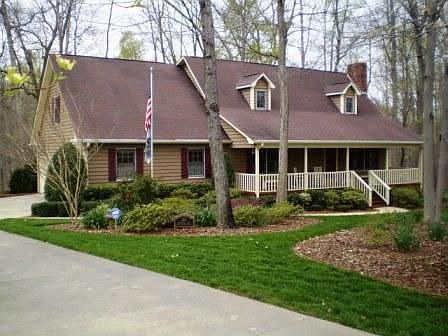 Adorable Cape Cod style home in private, serene setting