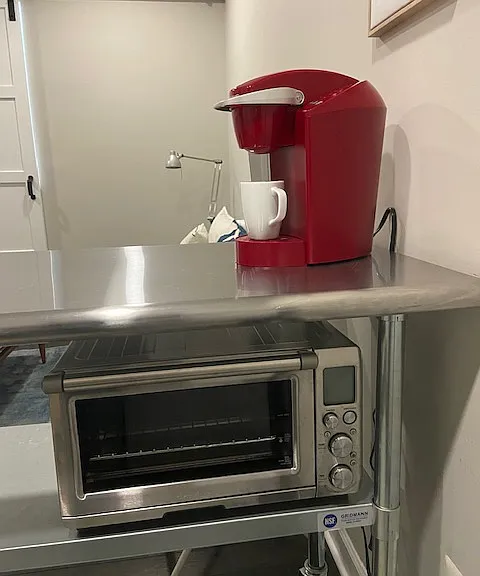 Stainless steel Breville convection oven with multiple settings. Does everything a traditional oven does, but in 30% less time.