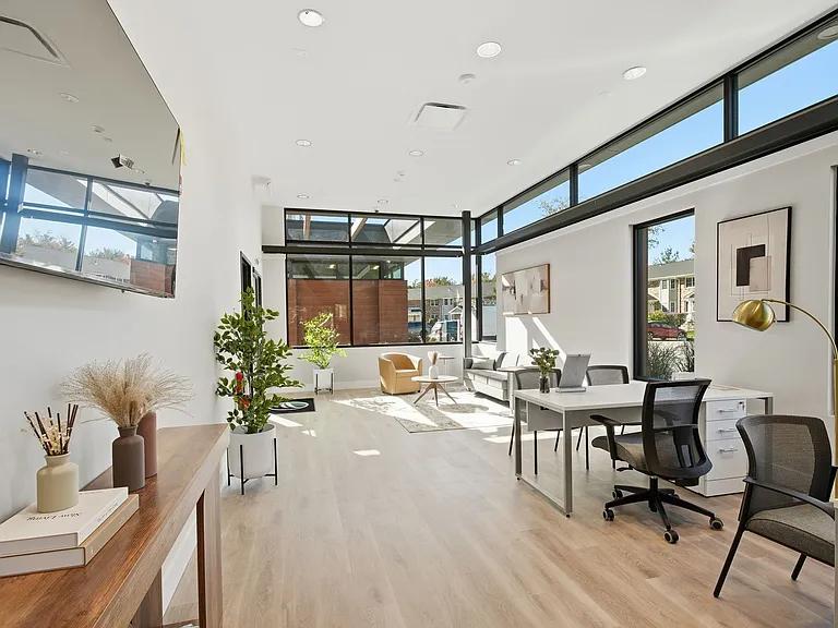 Elevate your living at Eagle Rock Apartments at Woodbury. This bright, airy space features sleek design, large windows, and a welcoming atmosphere, perfect for productivity and relaxation. Schedule your visit today and envision your future here!