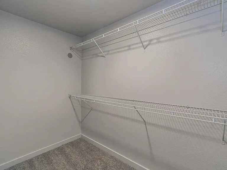 Keep your wardrobe organized with roomy walk-in closets.