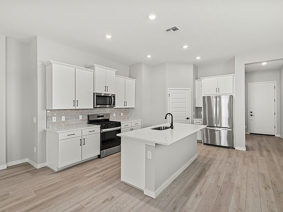 This floor plan has an open-concept layout perfect for entertaining.