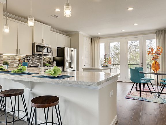 Kitchen overlooks dining area