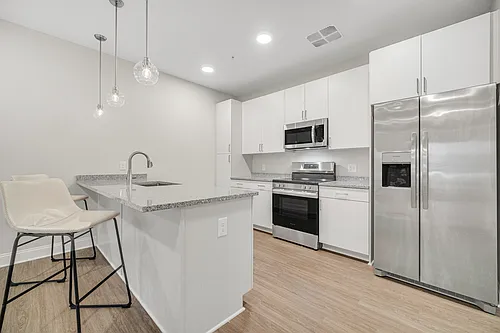 Park Lamont Apartments & Townhomes Photo 1