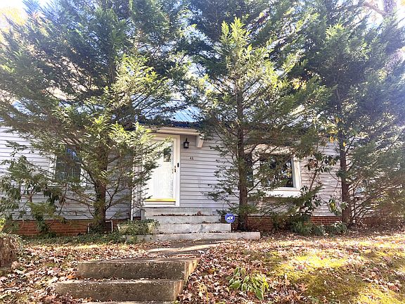 To the right of the front door is the Living Room with the Bay Window facing west, and sunsets.