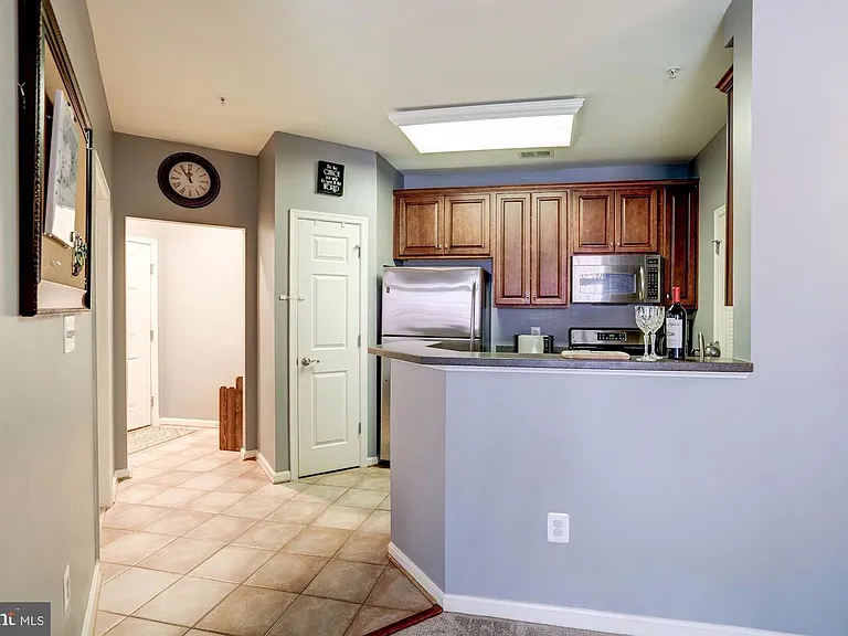 21228 McFadden Sq #211 — Photo 9