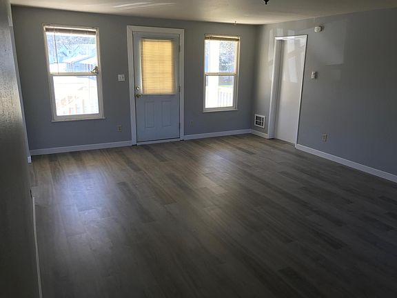Large living room new floors and fresh paint