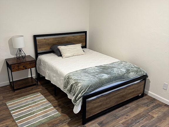 Guest bedroom two with new furniture and large closet.