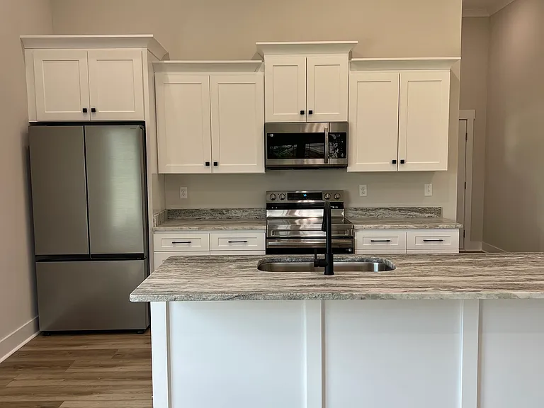 View of kitchen from dining area