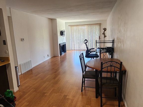 Living area/Dining area. Wall mounted bracket for TV