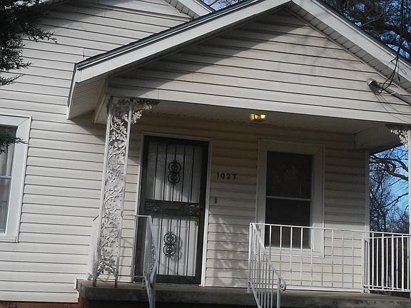 All windows have bars.