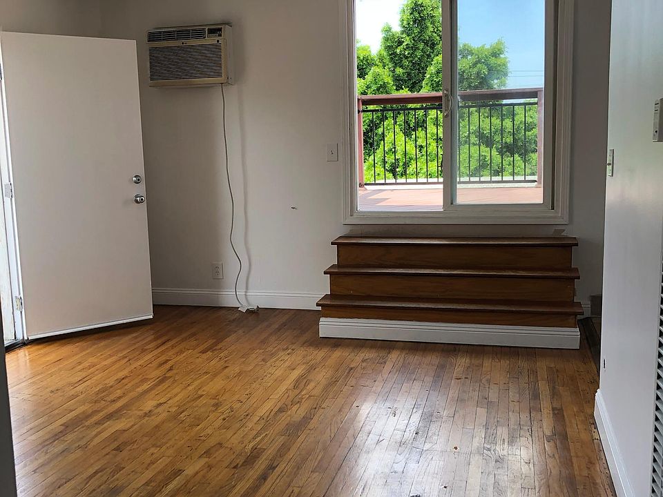 A/C in Living room. Original wood floors throughout.