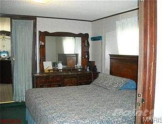 OPEN THE FRENCH DOORS AND ENTER TO A NICE SIZE MASTER SUITE