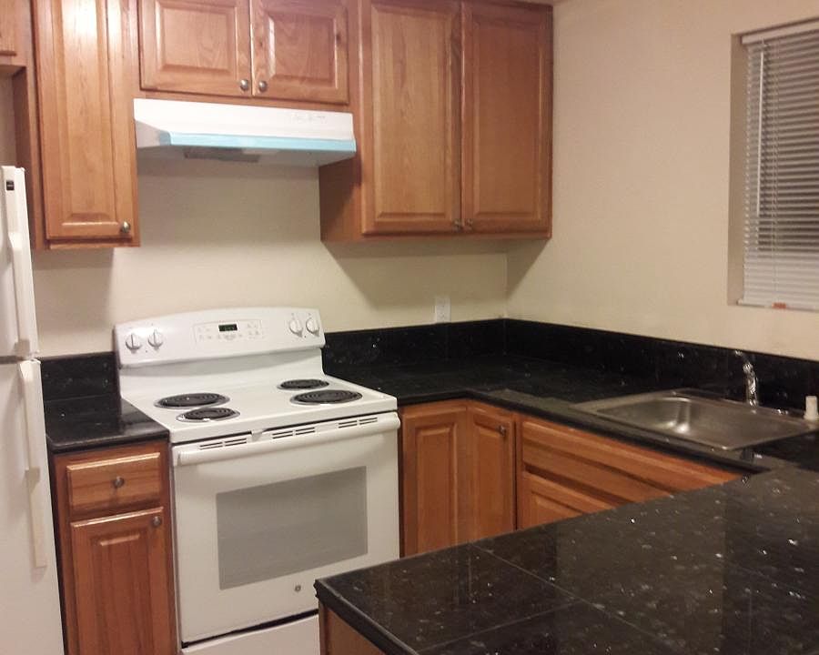 kitchen with granite tile counters