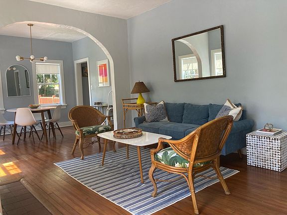 Living room and dining area to the left of front entrance.
