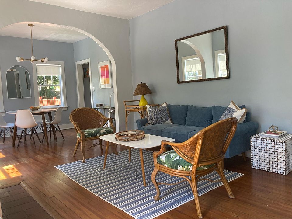 Living room and dining area to the left of front entrance.