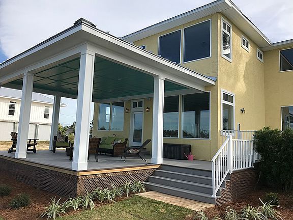 Large deck leads to pool 