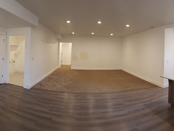 Panoramic of front room/kitchen