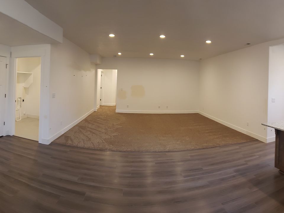 Panoramic of front room/kitchen