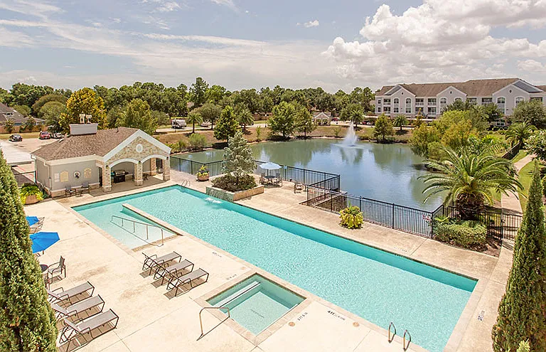 The Grand Parkway Apartments Swimming Pool and View of the Pond, Katy, Texas