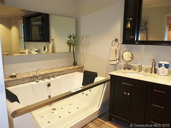 Both baths are fitted with ...