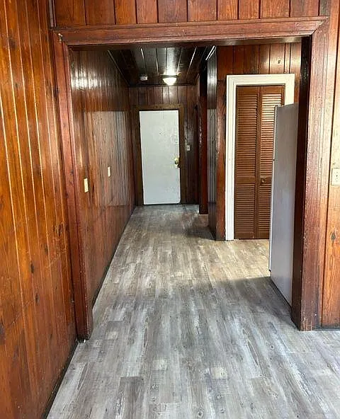 View from living room to front door. Also pantry in kitchen