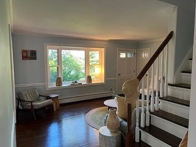 Front entryway view of stairs to 2nd floor