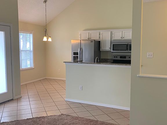Angle from living room showing breakfast area