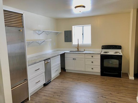 marble counter tops
large subzero fridge