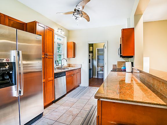 Shared kitchen entrance to shared laundry room