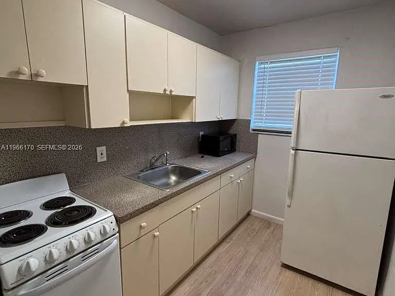 14140 NW 24th Ct #203 — Photo 3