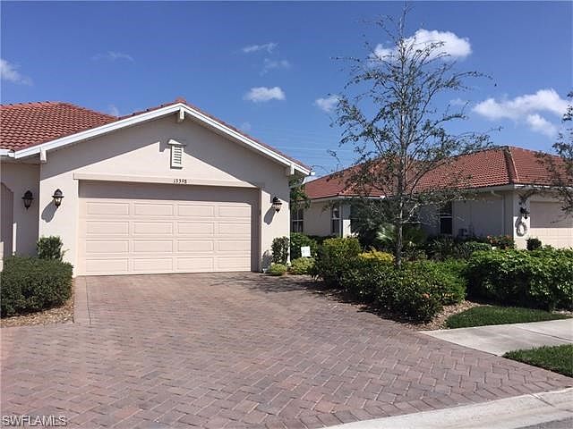 2 Car Garage w/ Sealed Paved Driveway