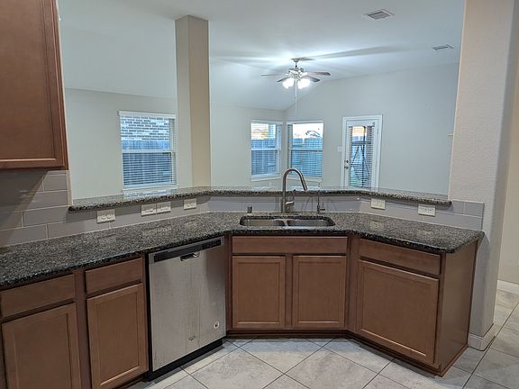 Kitchen next to open living area
