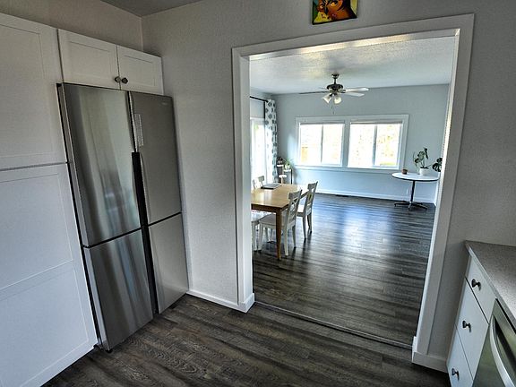 Kitchen Fridge opens to the dining room / family room
